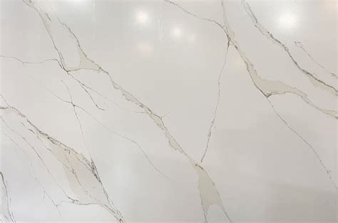 Unique Calacatta Quality Granite And Cabinetry