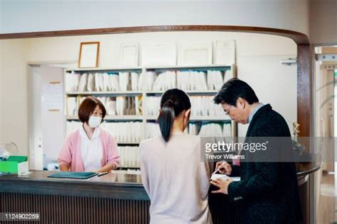 Hospital Registration Desk Photos and Premium High Res Pictures - Getty ...