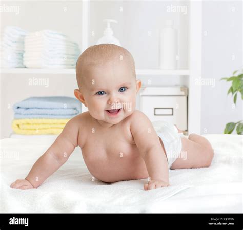Toddler girl in diaper hi-res stock photography and images - Alamy