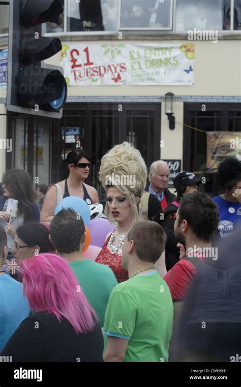 Gay Pride Festival Blond Wig And Spectators Stock Photo Alamy