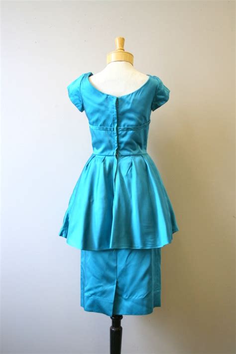 1960s Blue Satin Cocktail Dress With Peplum Gem