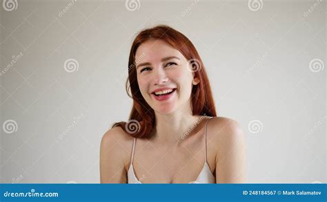 Young Beautiful Happy Girl Playfully Winks At The Camera Stock Video