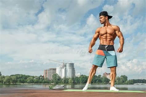 Muscular Sportsman With Naked Torso Posing Outdoors Stock Photo Image Of Brutal Sporty