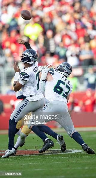 Geno Smith Of The Seattle Seahawks Throws A 50 Yard Touchdown Pass