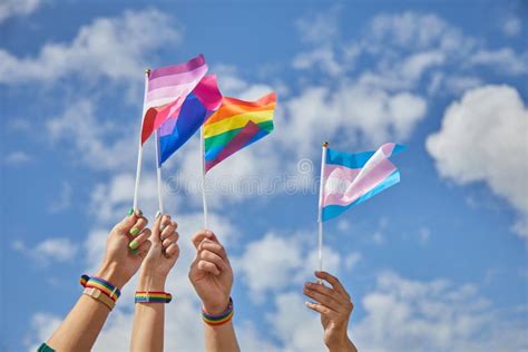 Lgbtq Pride Hands With A Flags As A Symbol Of Lesbian Gay Bisexual Transgender And Queer