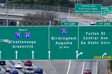Why are there different fonts on highway signs?
