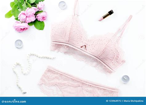 Woman Elegant Pink Lace Bra And Panties Flowers Jewelry Stylish Lingerie Flat Lay Stock Image