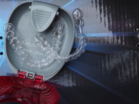 Premium Photo A Plastic Mouthpiece With The Words Keys To The Dentist