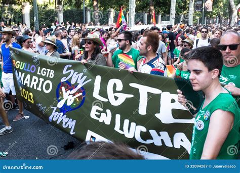 People Participating On A Demonstration At The Gay Pride Parade In Madrid Editorial Photography
