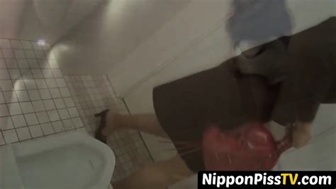 Japanese Chick With Hairy Pussy Peeing In Public Toilet Openly