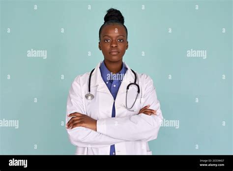 Confident African Female Doctor Looking At Camera On Mint Background