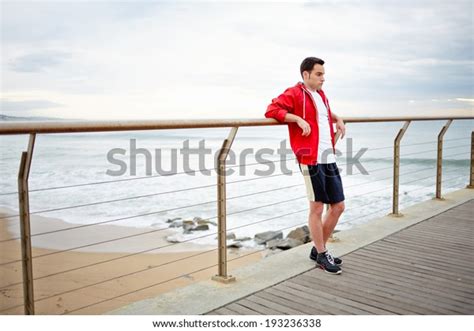 Sporty Guy Standing On Pier Leaning Stock Photo Shutterstock