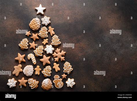 Cookies In Shaped Of Christmas Tree On Brown Background Xmas Festive