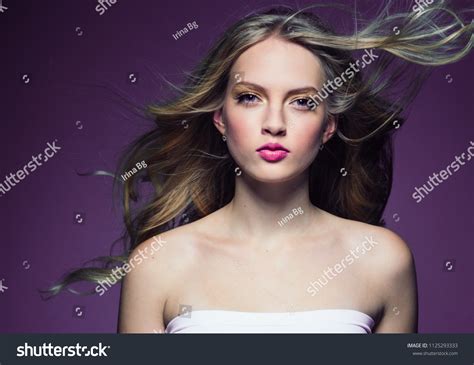Beautiful Female Blonde Long Curly Hair Stock Photo