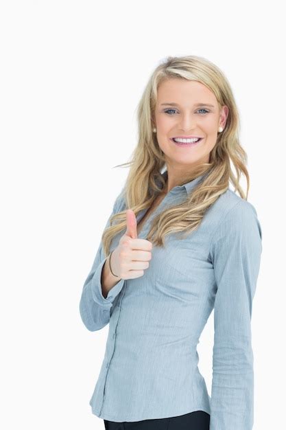 Premium Photo Blonde Holding Thumbs Up