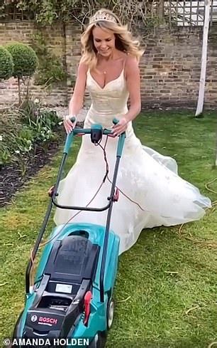 Amanda Holden Slips Into A Skimpy Pink Bikini As She Sips On Wine While Sunbathing In Her Garden