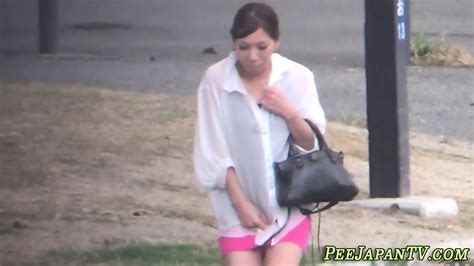 Kinky Japanese Babe Pees On The Street