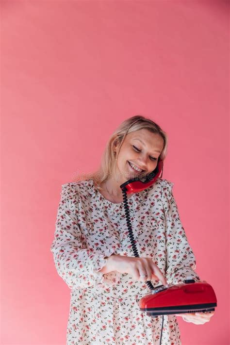 Blonde Woman Smiling And Talking On Wired Phone Stock Image Image Of Office Headphones 347389339