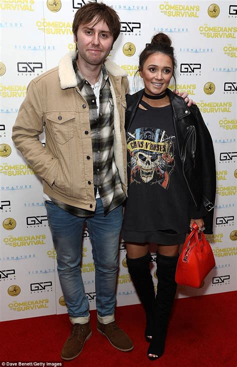 James Buckley and wife Clair Meek cosies up to hubby on London red