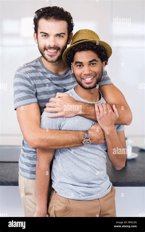 Happy Gay Couple Hugging Stock Photo Alamy