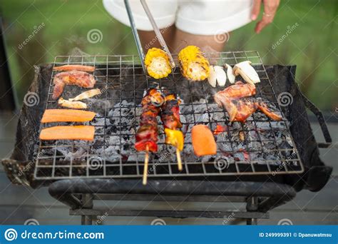 Delicious Grilled Meat With Smoke Bbq With Vegetables In Outdoor Barbecue Party Lifestyle