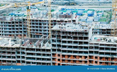 Time Lapse Builders And Cranes Working On The Construction Site Close