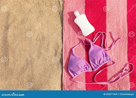 Beach Towel With Bikini Top And Sunscreen On Sand Flat Lay Space For Text Stock Image Image