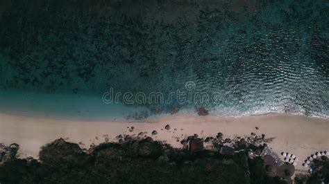 Birds Eye View Of Transparent Blue Waters With Coral Reefs Cliffs