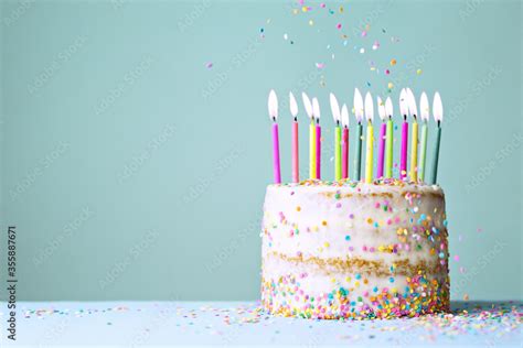 Naked Funfetti Birthday Cake With Candles Stock Photo Adobe Stock