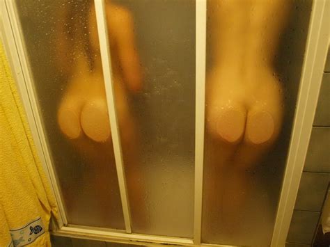 Pair Of Naked Buttocks Against The Shower Cabin Pussy Pictures Asses Boobs Largest