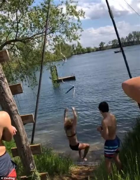 Friends Watch As Girl In A Bikini Has Spectacular Rope Swing Fail Daily Mail Online