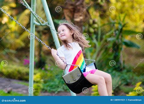 Child Swinging On Playground Kids Swing Stock Image Image Of Flying