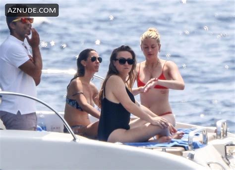 Amber Heard Enjoys A Day In A Red Bikini With Friends Aboard A Yacht On The Amalfi Coast Aznude