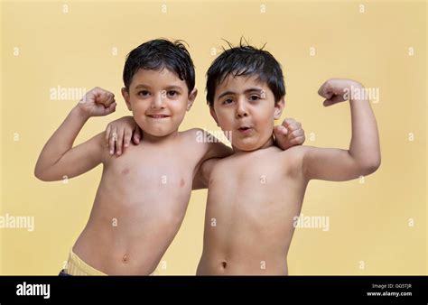 Asian Boy Flexing Muscles Hi Res Stock Photography And Images Alamy