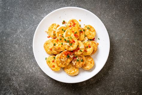 Premium Photo Fried Soft Egg Tofu With Garlic