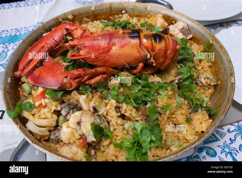 Seafood Paella With Lobster Stock Photo Alamy