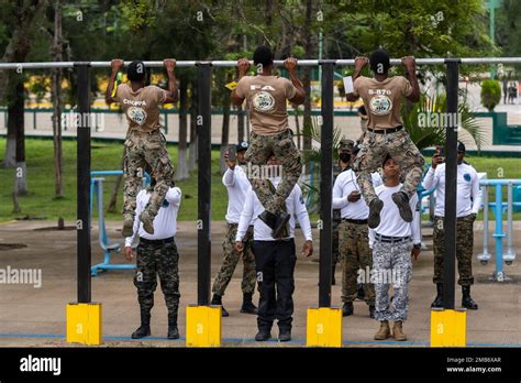 Jamaica Team Members Perform The Pullup Portion Of The Physical