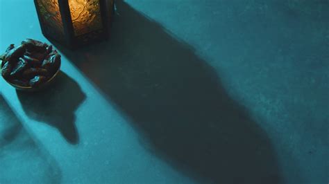 Free Stock Video High Angle Tracking Shot Of Dates Water And Lantern