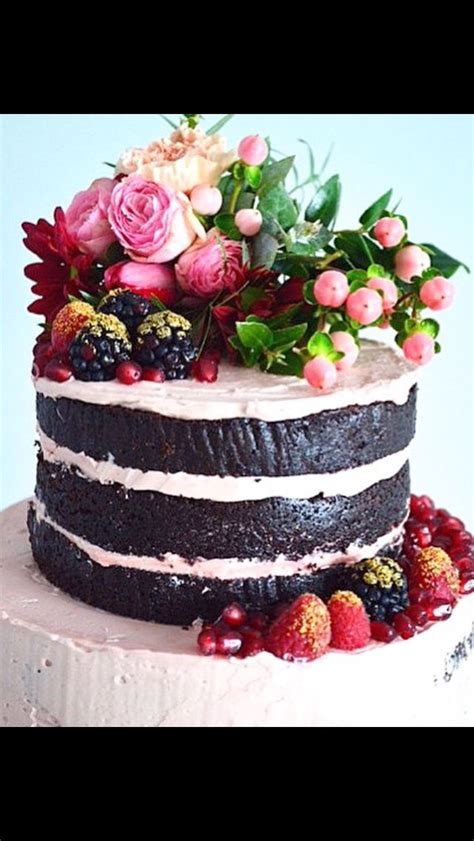 Chocolate And Pomegranate Naked Cake With Gold Berries And Fresh Florals