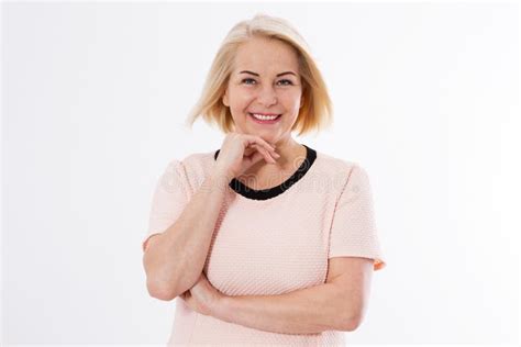 Happy Blonde Middle Aged Woman In Red Suit Isolated On White Background Holding Phone Stock