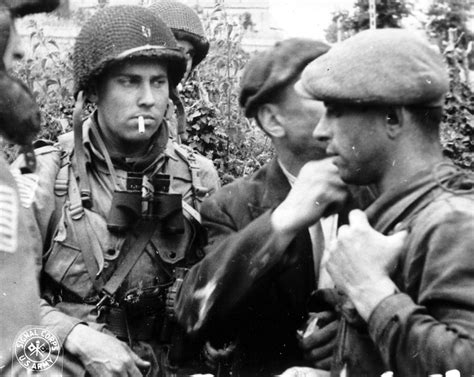 Members of the French Resistance and the U.S. 82nd Airborne division in