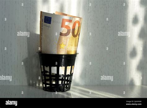 Euro Banknote In A Trash Bin The Concept Of The Collapse Of The Euro