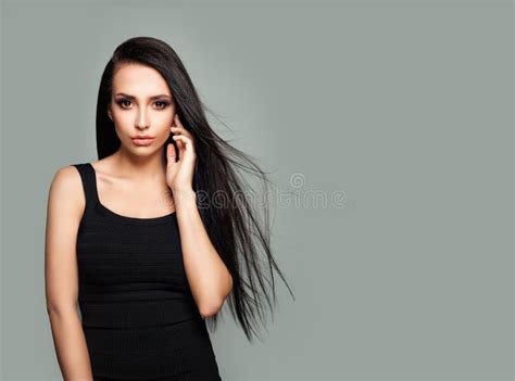 Cute Brunette Woman Fashion Model With Long Healthy Hair Stock Image