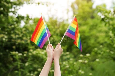 Teenager Holds Two Rainbow Flag LGBT In His Hands Pride Month Lesbian Gay Bisexual Transgender
