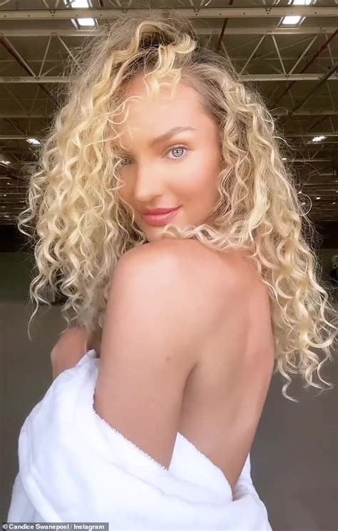 Candice Swanepoel Shows Off Bouncy Ringlets And Poses In A White Robe