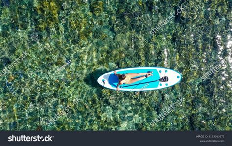 Attractive Woman Bikini Sunbathing On Surfboard Stock Photo Shutterstock