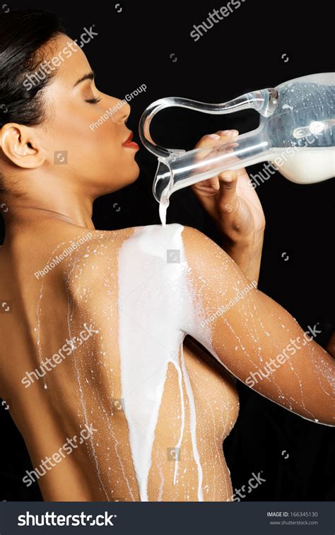 Beautiful Naked Woman Pouring Milk On Stock Photo Shutterstock