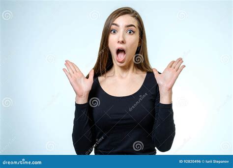 Portrait Of A Beautiful Brunette Girl With A Surprised Look Stock Photo Image Of Female