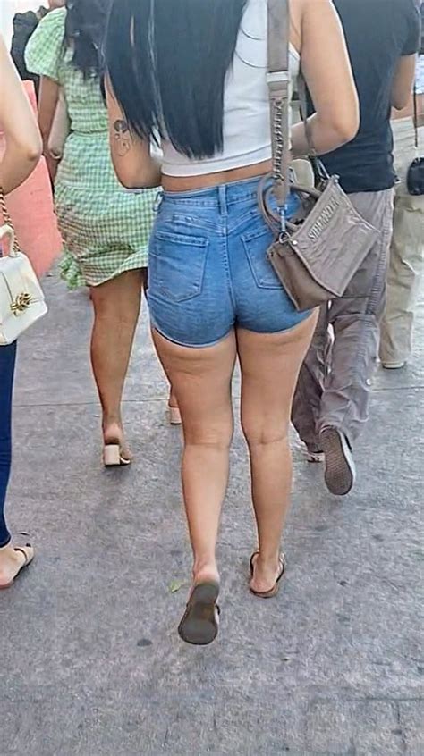 OC VIDEO Super Sexy Denim Short Shorts On This Brunette With Tremendous Legs And Big Butt