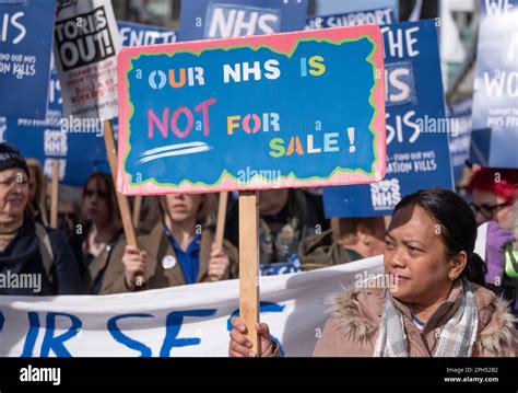 Protesters At The SOS NHS National Demo In London Supporting Striking